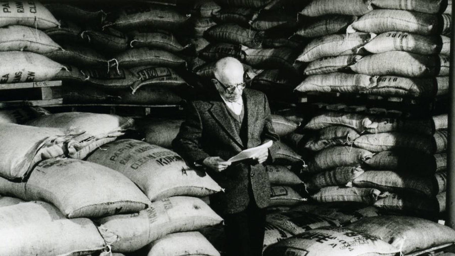 Francisco Gaviña inspecting coffee bags